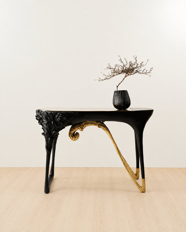 Black brass console table with gold legs