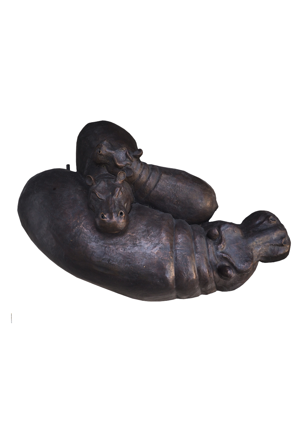 Bronze sculpture of a family of hippos resting their heads on top of each other. 