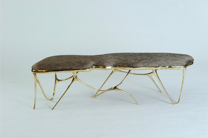 Gold brass luxury handmade furniture bench with brown pattern cushion with modern design, ideal for modern luxury decor, on a white background.