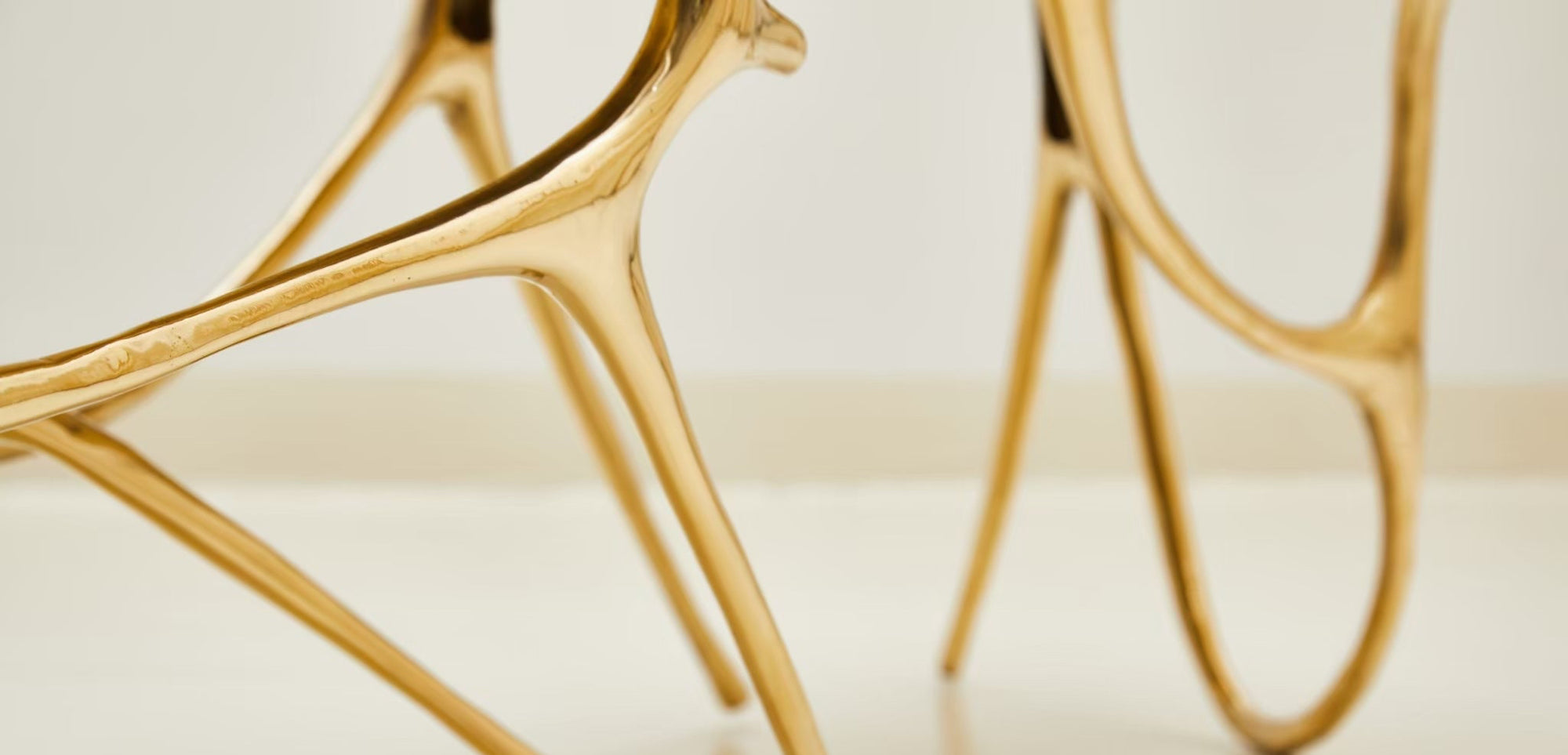 Close up of the Sumi Bench with gold finish.