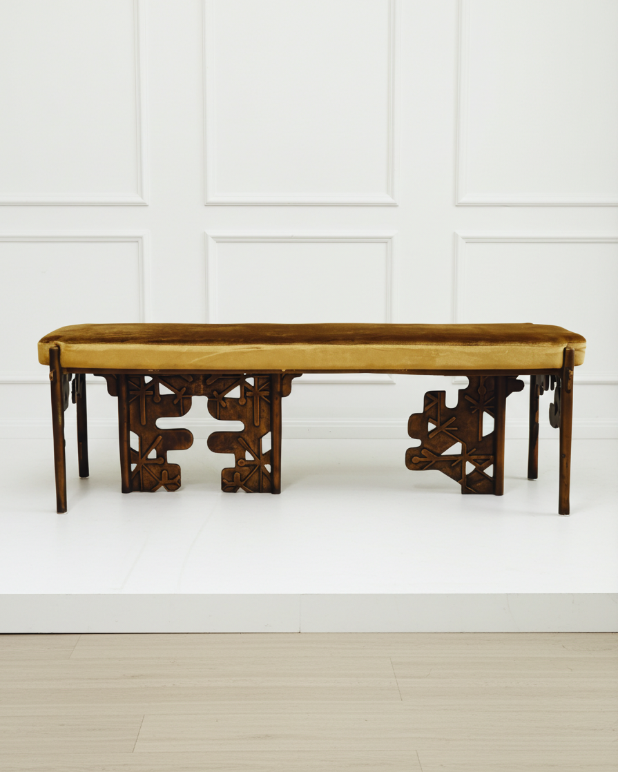 Relic Bench with gold velvet cushion. Sculptural frame with a bronze finish. Click to view product. 