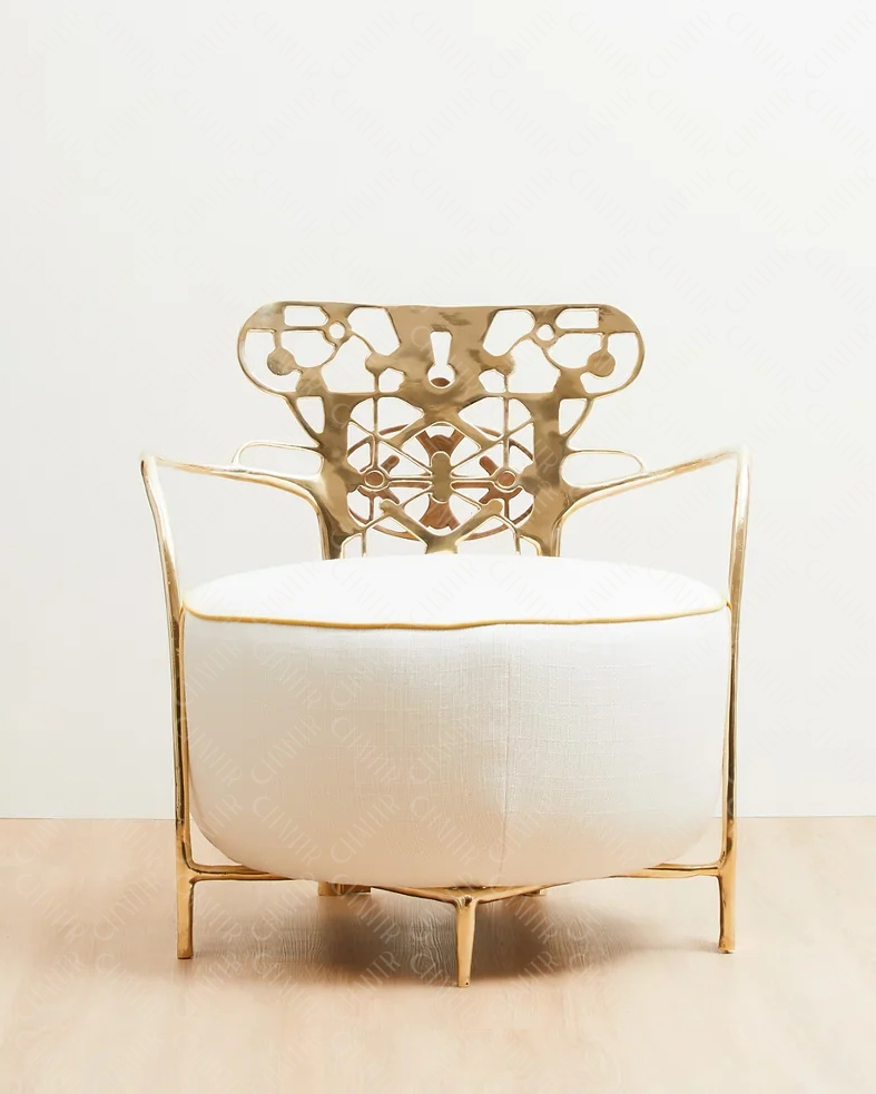 Relic Lounge Chair gold finish with and white cushion. Click to view product.