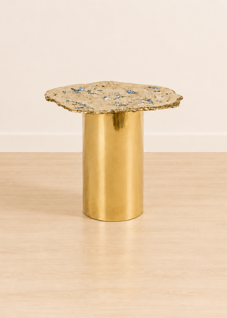 Gold brass accent table with cylindrical bases and textured organic shaped tops