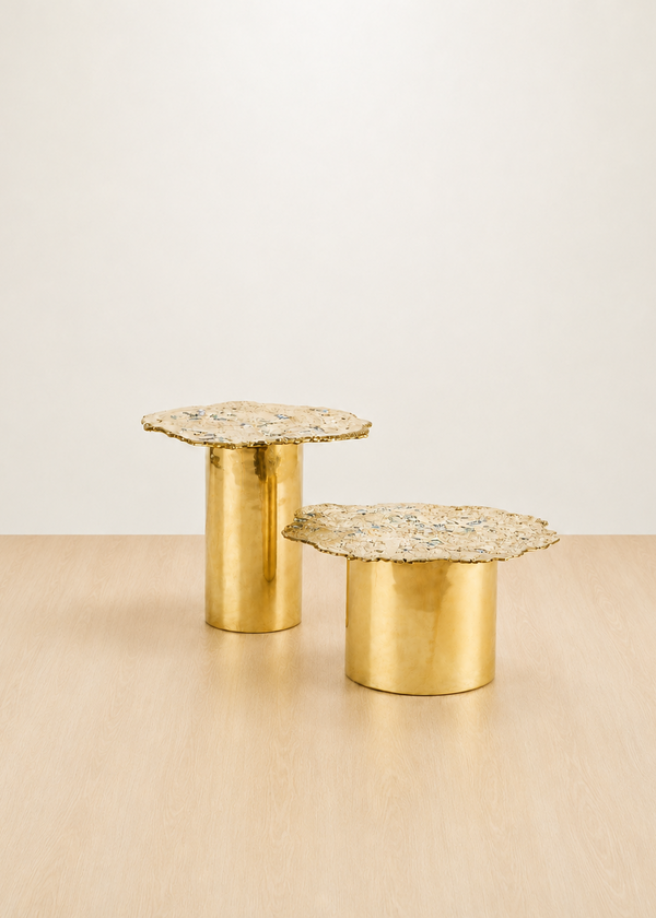 Gold brass accent tables with cylindrical bases and textured organic shaped tops