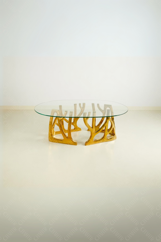 Glass table with gold brass luxury handmade furniture base, perfect for modern luxury decor, on a white background.