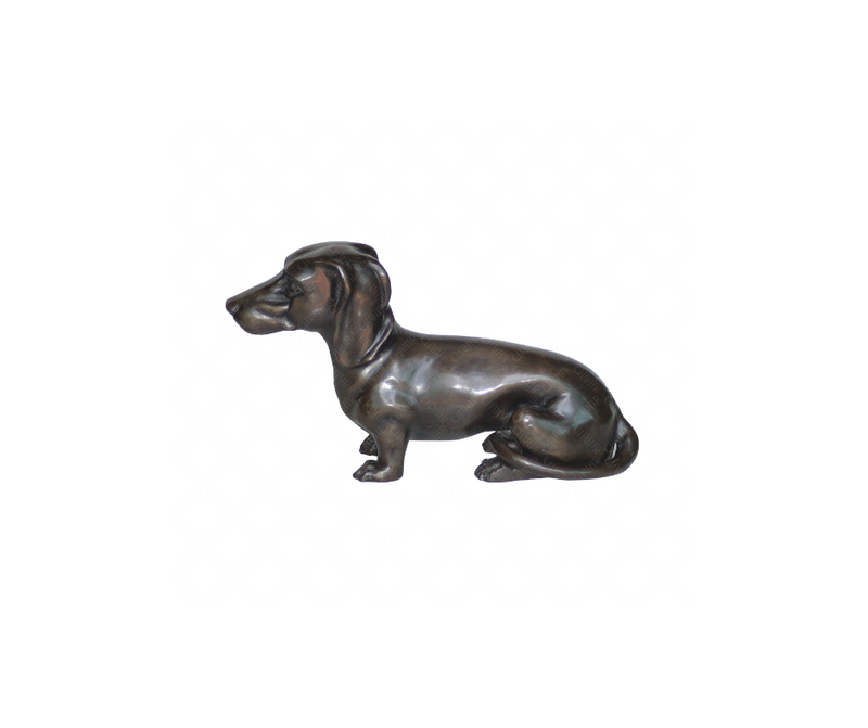 Bronze sculpture of a dachshund on a white background
