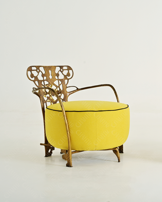 Yellow chair with intricate backrest design on a light gray background. Luxury handmade furniture