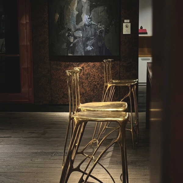 Sumi Brass stools in bar area.