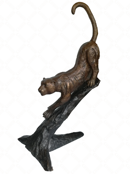 Bronze luxury handmade furniture sculpture of a leopard on a branch, perfect for modern luxury decor, against a white background.