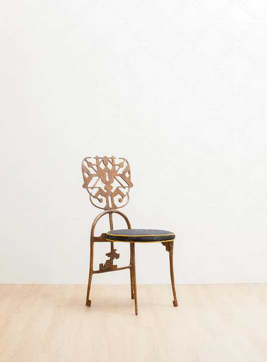 Decorative brass luxury handmade furniture chair with intricate backrest design, ideal for modern luxury decor, on a plain background.