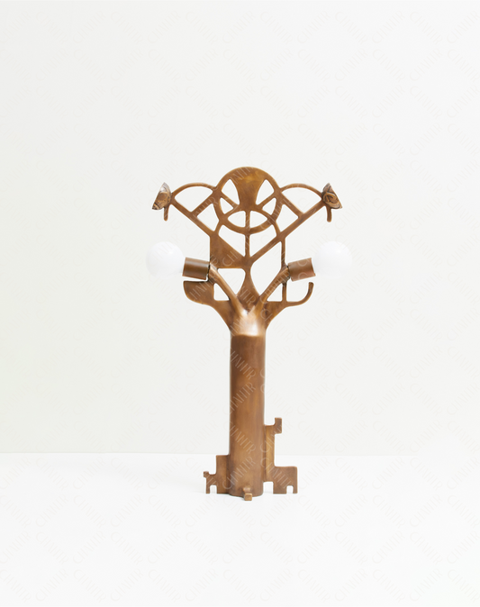 Decorative key-shaped gold brass luxury handmade furniture lamp with intricate design, perfect for modern luxury decor, on a white background.