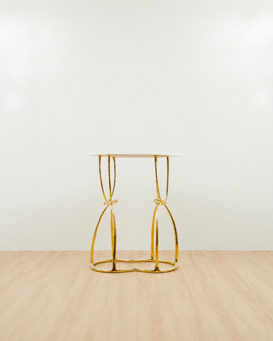 Gold brass luxury handmade furniture console, perfect for modern luxury decor, on a wooden floor with white wall background.