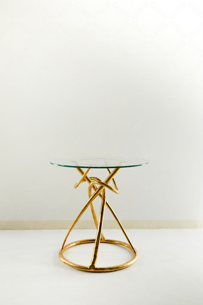 Gold brass luxury handmade furniture side table with glass top, perfect for modern luxury decor, on a white background.