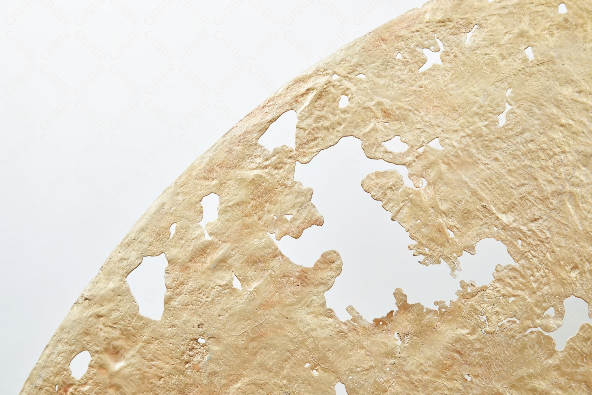 Close-up of a gold brass modern luxury decor on white background