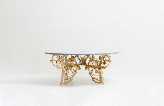 Gold brass luxury handmade furniture coffee table with decorative base, perfect for modern luxury decor, on a white background.