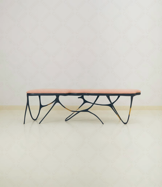 Black brass luxury handmade furniture bench with pink cushion with modern design, ideal for modern luxury decor, on a white background.