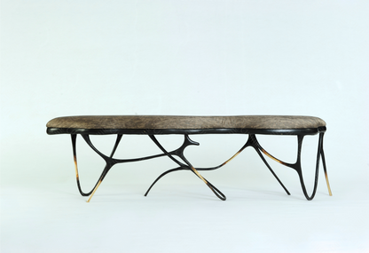 Black brass luxury handmade furniture bench with brown pattern cushion with modern design, ideal for modern luxury decor, on a white background.