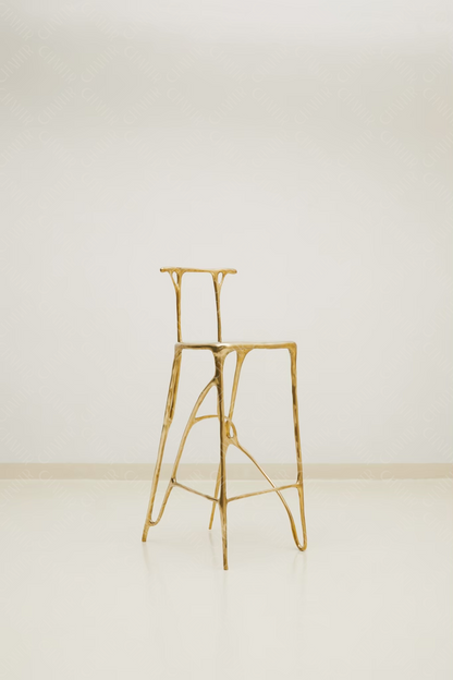 Gold brass luxury handmade furniture bar stool, perfect for modern luxury decor, against a white background - side angle