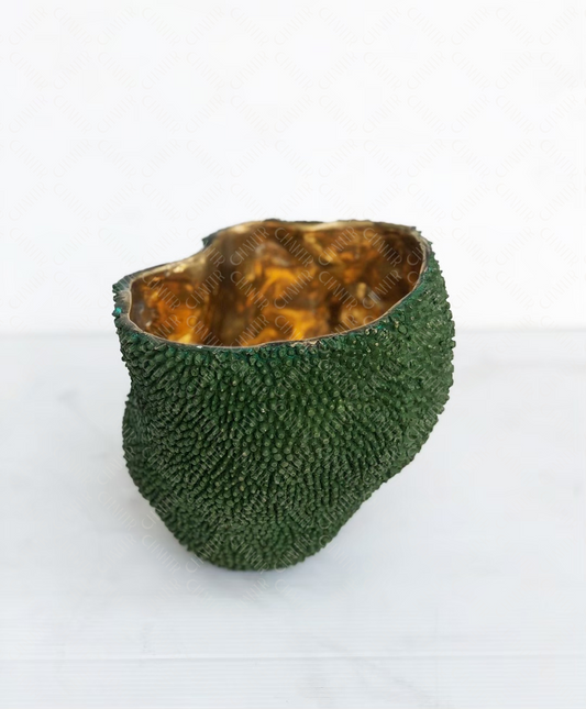 Decorative luxury handmade furniture bowl with green textured exterior and gold brass interior, perfect for modern luxury decor, on a white background.