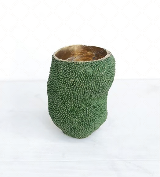 Decorative luxury handmade furniture bowl with green textured exterior and gold brass interior, perfect for modern luxury decor, on a white background.