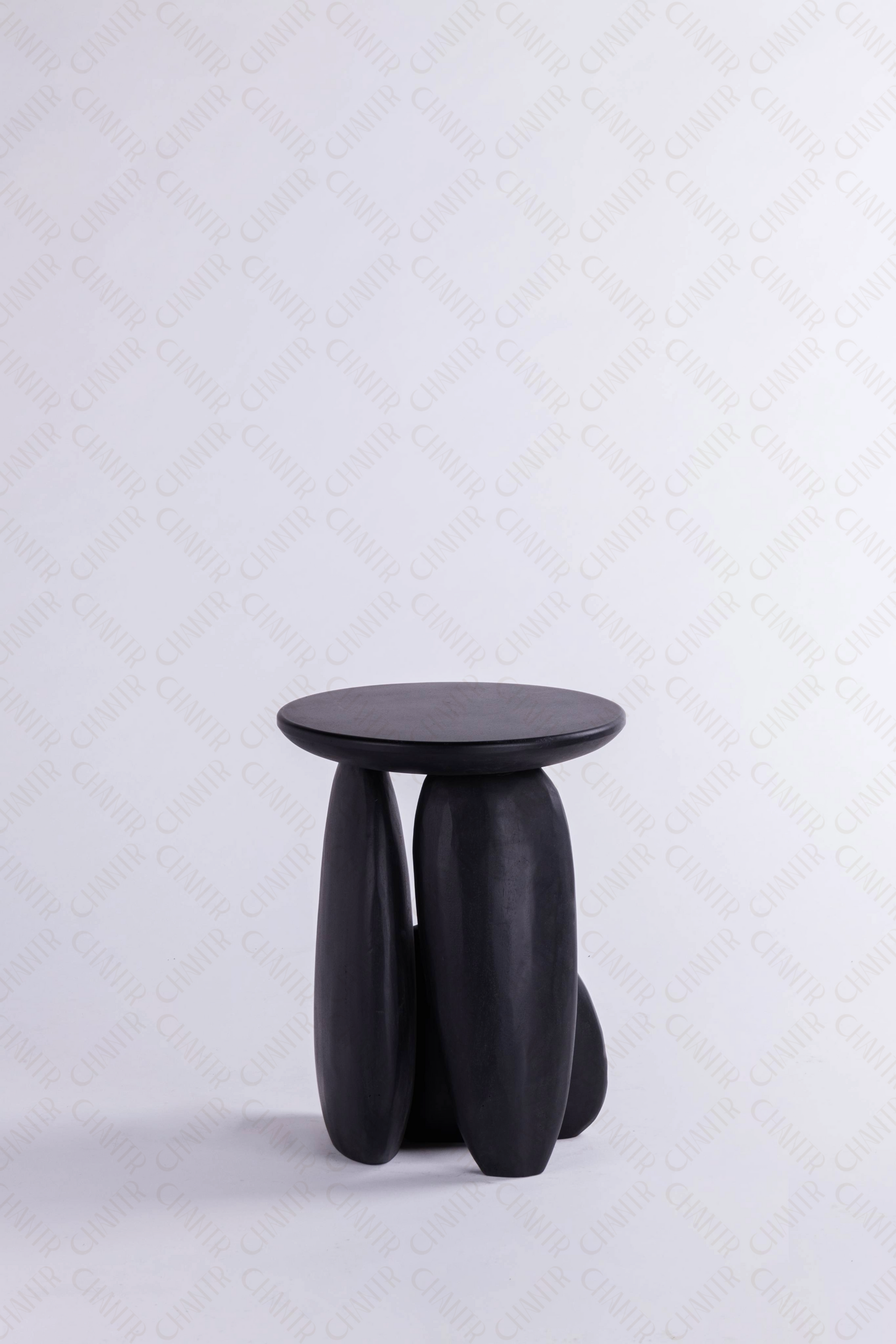 Black luxury handmade furniture side table, ideal for modern luxury decor, on a white background.